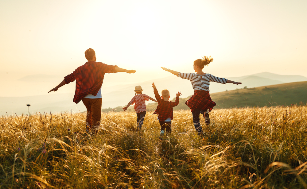 Happy,Family:,Mother,,Father,,Children,Son,And,Daughter,On,Nature